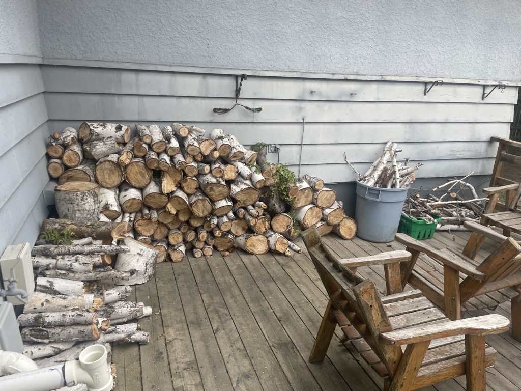Stacked firewood on deck